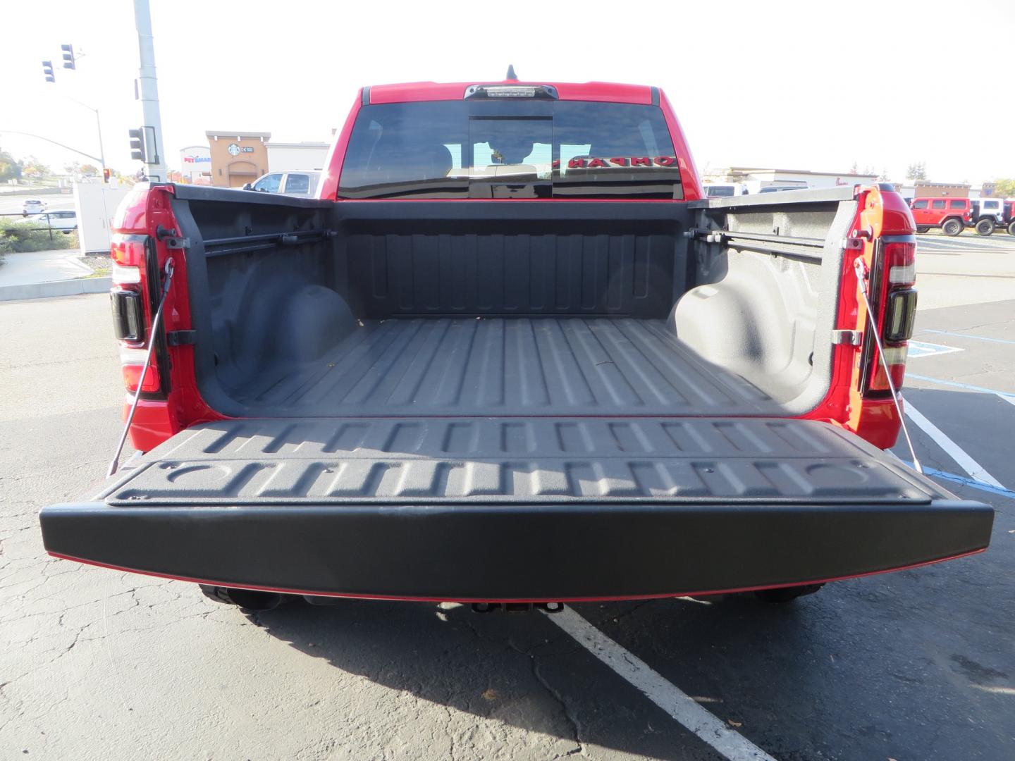 2023 Red /BLACK RAM 1500 Ram 1500 TRX Crew Cab 4x4 (1C6SRFU9XPN) with an 6.2L Supercharged HEMI V8 SRT engine, 8 Speed Auto 8HP95 transmission, located at 2630 Grass Valley Highway, Auburn, CA, 95603, (530) 508-5100, 38.937893, -121.095482 - Must see TRX featuring Eibach front and rear springs, 18" Method NV double black wheels, 37" Nitto Ridge Grappler tires, and window tint. - Photo#14